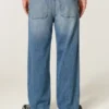 Baggy-Jeans mit Alien-Grafik in mittlerer Waschung