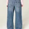 Baggy-Jeans mit niedriger Leibhöhe, dunkler Waschung und Blumenstickerei