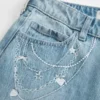 Baggy-Jeans mit niedriger Leibhöhe, heller Waschung und Kettenstickerei