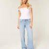 Baggy-Jeans mit niedriger Leibhöhe, heller Waschung und Nietenverzierungen