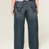 Baggy-Jeans mit niedriger Leibhöhe und dunkler Waschung im Y2K-Stil