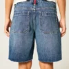 Baggy-Jeansshorts mit niedriger Leibhöhe, dunkler Waschung und amerikanischer Flagge