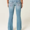 Bootcut-Jeans mit niedriger Leibhöhe, mittlerer Waschung und floraler Stickerei