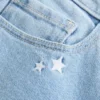 Bootcut-Jeans mit niedriger Leibhöhe und Sternstickerei