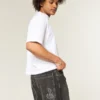 Gewaschene schwarze Baggy-Jeans mit Schlangenstickerei