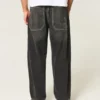 Gewaschene schwarze Baggy-Jeans mit Schlangenstickerei
