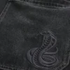 Gewaschene schwarze Baggy-Jeans mit Schlangenstickerei