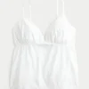 Glitzerndes Babydoll-Oberteil mit Stickerei