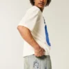 Hellblaue Baggy-Jeans mit gesticktem Würfel-Motiv