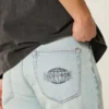 Hellblaue Downforce Racing Graphic Loose Jeans