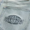 Hellblaue Downforce Racing Graphic Loose Jeans