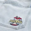 Hellblaue New York Graphic Super Baggy Jeans