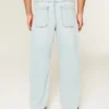 Hellblaue Skater-Baggy-Jeans mit Spielkartengrafik