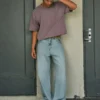 Hellblaue Super-Baggy-Jeans mit Astronauten-Grafik