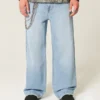 Hellblaue Super-Baggy-Jeans mit Astronauten-Grafik