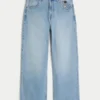 Hellblaue Super-Baggy-Jeans mit Astronauten-Grafik