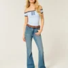 Hoch geschnittene Flare-Jeans in mittlerer Waschung