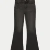 Hoch geschnittene, gewaschene schwarze Flare-Jeans