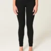 Hoch geschnittene schwarze Jeans-Leggings