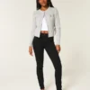 Hoch geschnittene schwarze Jeans-Leggings