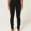Hoch geschnittene schwarze Jeans-Leggings