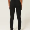 Hoch geschnittene schwarze Jeans-Leggings