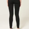Hoch geschnittene schwarze Jeans-Leggings