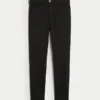 Hoch geschnittene schwarze Jeans-Leggings