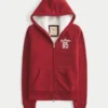 Holiday Vault Release Sherpa-gefütterter Hoodie mit Reißverschluss und Logo-Grafik