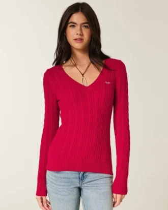 Ikonischer Pullover mit V-Ausschnitt und Zopfmuster