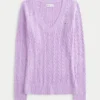 Ikonischer Pullover mit V-Ausschnitt und Zopfmuster