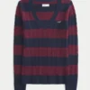 Ikonischer Pullover mit V-Ausschnitt und Zopfmuster