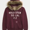 Kapuzenjacke mit Kunstfellbesatz, Reißverschluss und Logo-Grafik