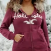 Kapuzenjacke mit Kunstfellbesatz und Logo-Grafik