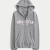 Kapuzenjacke mit Kunstfellbesatz und Logo-Grafik