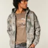 Kastiger Kapuzenpullover mit Reißverschluss und Camouflage-Muster