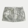 Kurviger Minirock aus Camouflage-Denim mit niedriger Leibhöhe