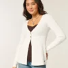 Langärmelige Flyaway Babydoll-Strickjacke
