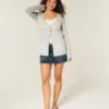 Langärmelige Flyaway Babydoll-Strickjacke