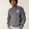 Locker geschnittener Sweater mit Grafik und Reißverschluss