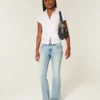 Low-Rise-Jeans mit mittlerer Waschung und gesticktem Schmetterling, Bootcut