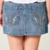 Low-Rise-Minirock aus besticktem Denim