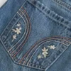 Low-Rise-Minirock aus besticktem Denim
