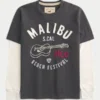 Mehrlagiges Langarm-T-Shirt mit Logo-Grafik