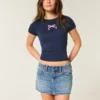 Mini-Jeansrock mit niedriger Taille und gestickter Schleife