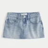 Mini-Skort aus Denim mit niedriger Leibhöhe und Sternstickerei