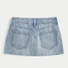 Mini-Skort aus Denim mit niedriger Leibhöhe und Sternstickerei
