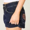 Mini-Skort aus dunkelblauem Denim mit Karomuster und Taschen