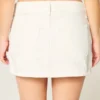 Mini-Skort aus weißem Denim mit niedriger Leibhöhe