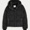 Mit Kunstfell gefütterte Daunenjacke